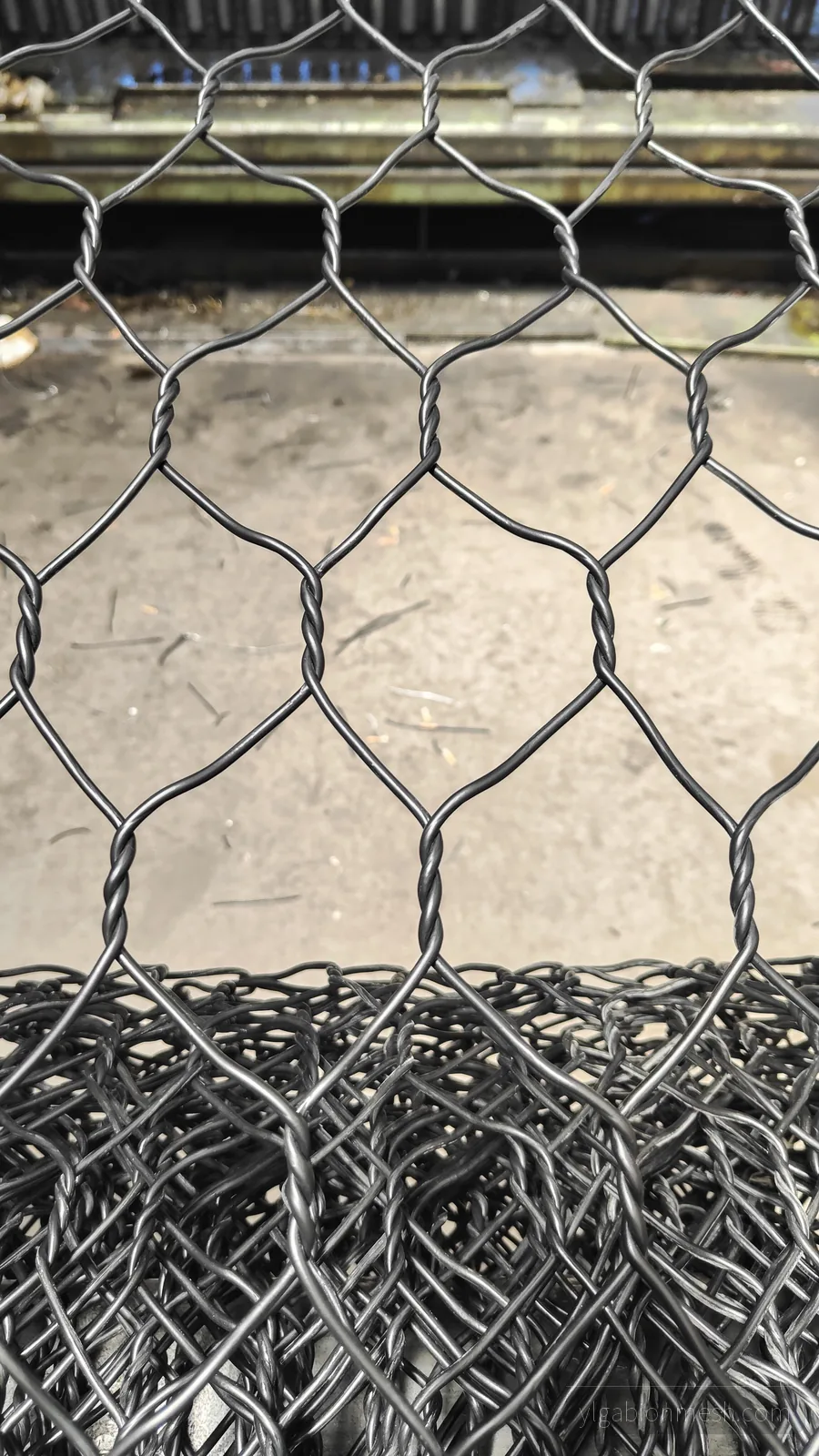 Black Galfan PVC coated rockfall netting 80x100mm mesh detail